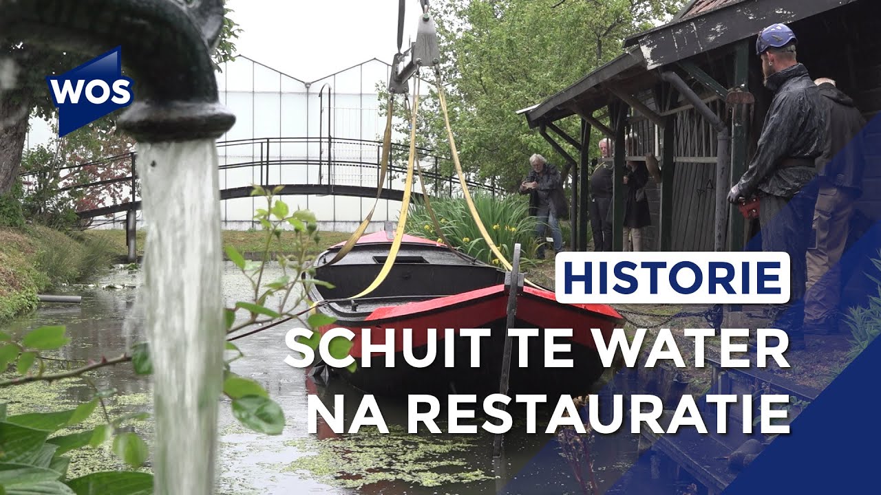 Historische schuit te water bij het Westlands Museum