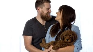 Couple Take Adorable Newborn Photos with Their Puppy to Mock New Parents