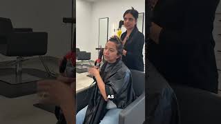 Teaching client step by step curling iron curls with the clamp 1:1 classes available through insta