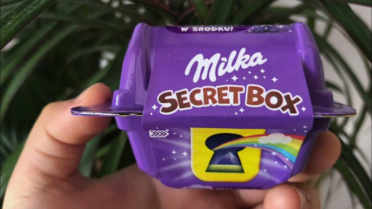 Видео с милкой. Милка Secret Box. Конфеты Milka Secret Box. Milka Secret Box игрушки. Сюрприз бокс Милка.