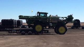 JD4038R loading on Roadruner Sprayer trailer