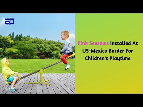 Pink Seesaws Installed At US-Mexico Border For Children's Playtime