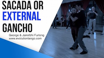 Intermediate tango class by George and Jairelbhi Furlong:  sacada or gancho.