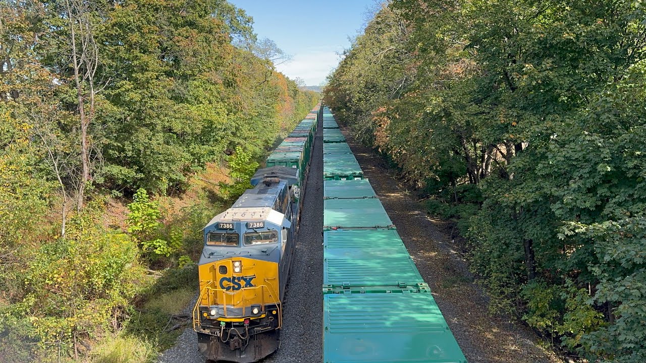 CSX 7386 CM44AH leads CSX M409 through Manville NJ 10/17/2025