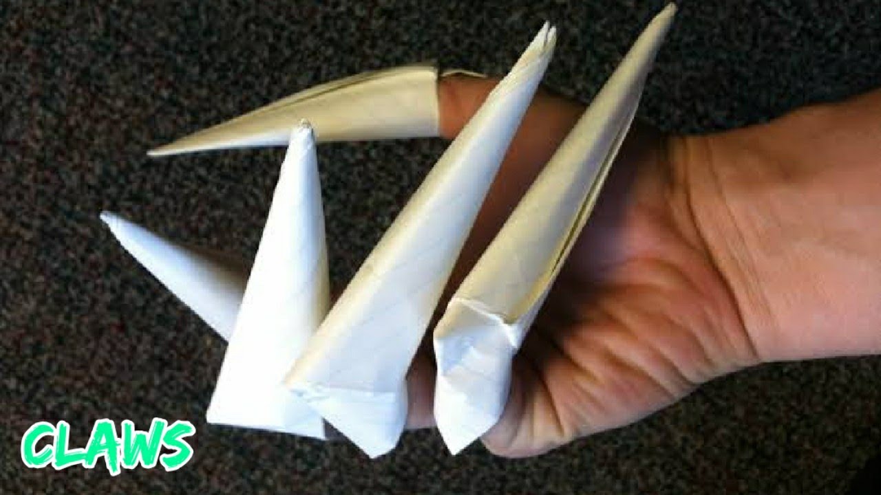 Коготь из бумаги видео. Бумажные когти на пальцы. Оригами когти. Когти из картона. Когти из бумаги оригами.