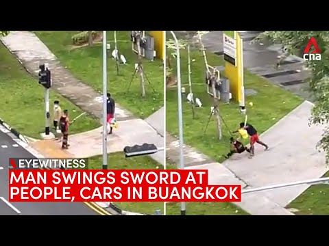 Man swinging sword at people, cars in Buangkok | Eyewitness video