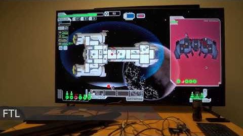 LattePanda attached to a 65" Monitor, playing FTL and Half Life 2