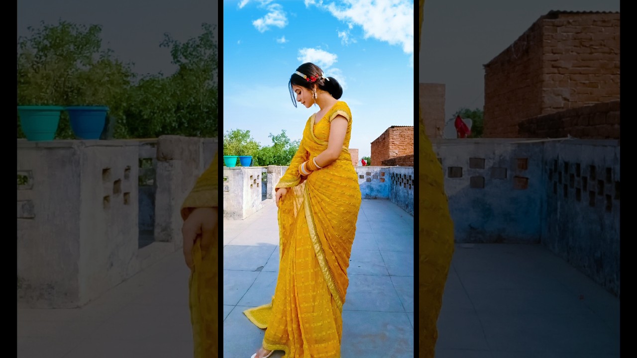 Indian Traditional Beautiful young girl in saree posing outdoors 4976617  Stock Photo at Vecteezy