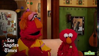 Elmo gets vaccinated against COVID-19