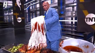 Chuck putting BBQ sauce on chicken using a mop