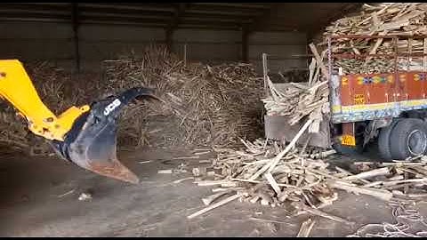 JCB 530-70 Telehandler (formerly Loadall) with Grapple Bucket - Loading Wooden Chips on Truck