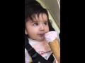 Baby eating ice cream for the first time