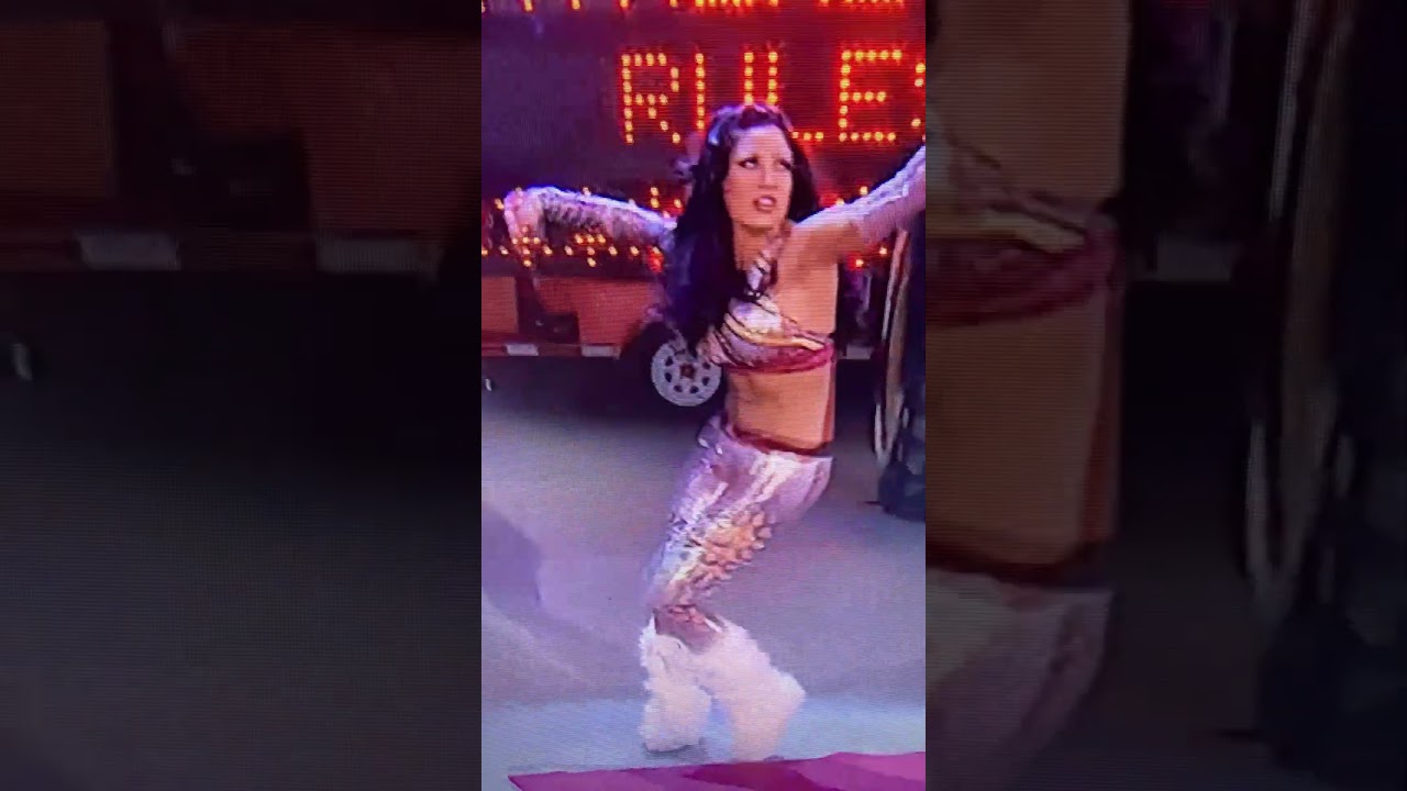 Camera Man falls during Melina’s entrance 