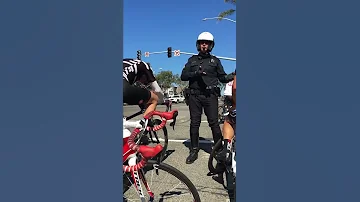 Cop Pulls Over a Group of Cyclists