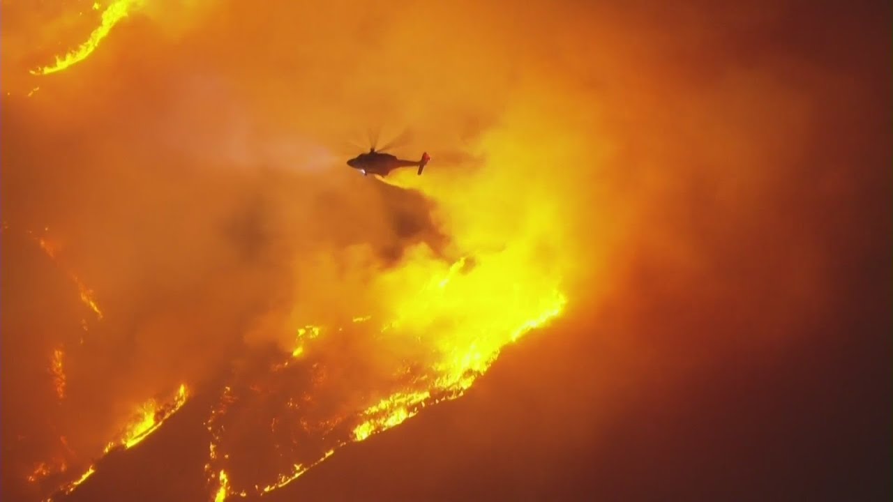 Crews battle growing brush fire in Sepulveda Pass off 405 Freeway in L ...