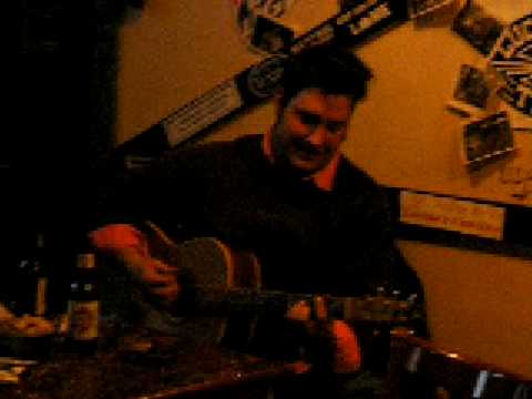 neil-playing-guitar-at-harry's,-in-alpine,-texas,-january-2009