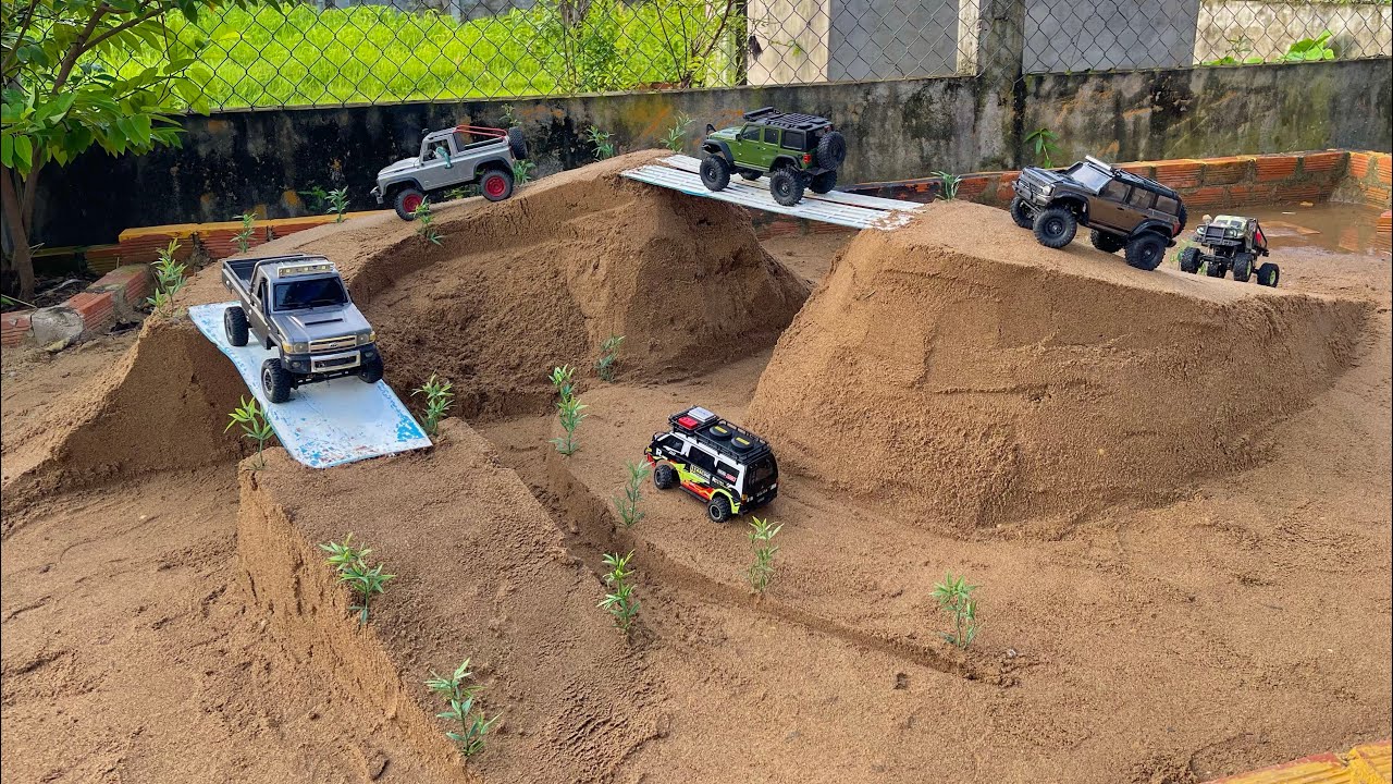 RC car obstacles over mountain peaks and bridges,Rc Toyota Defender Jeep Bronco Crawler Mitsubishi.