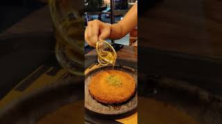 Kunafa is a traditional Middle Eastern dessert made with spun pastry and cheese and cream