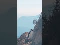 Extreme Risk Construction | Operator Builds Mountain Road with Excavator in Harsh Conditions