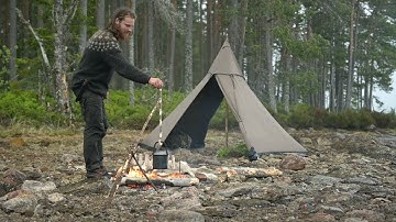 Solo bushcraft trip - canvas tent, 3 camps, rain, adjustable pot hangers, homemade knife etc.