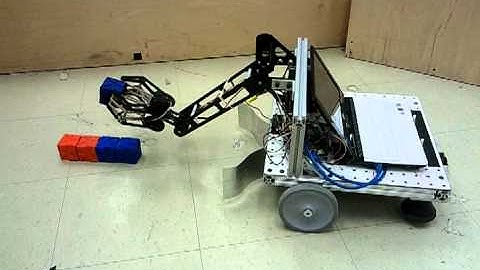 Robot Collecting Blocks and Assembling a Tower