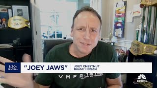 CNBC's 2024 Stock Draft: Hot dog eating champ Joey Chestnut chooses Oracle for his first-round pick