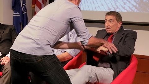 A Roomful Of People Condemn 5 Innocent Men