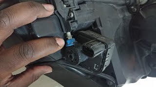 Automatic headlight keeps going up & down. Bad AFS motor? Disable it