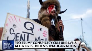 QAnon believers splinter after President Joe Biden's inauguration