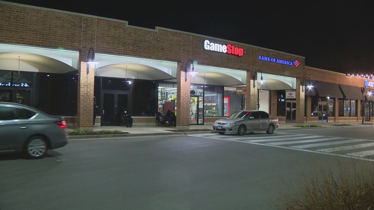 Several brave the cold, virus risks to wait for next generation gaming systems