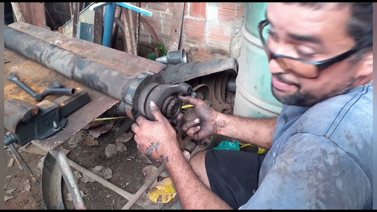 trocando o rolamento de centro da transmissão do 112😎