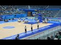 Team China and Team Japan are warming up in the arena