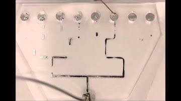 Steering Liquid Metal Flow in Microchannels using Low Voltages