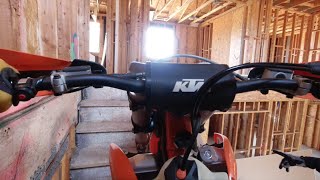 RIDING MY DIRTBIKE UP A 2 STORY HOUSE *FAIL*