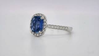 Cushion-Cut Sapphire and Diamond Halo Ring in 18K White Gold