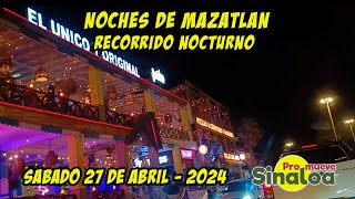 Un recorrido de noche por Mazatlán en fin de semana abarrotado de turistas nacionales y extranjeros.