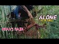 Alone in the heavy rain cooking bamboo shoots and sleeping in the warm tree shelter fire