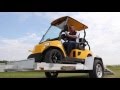 Aluma 6310h bt utility trailer with a golf cart