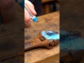 Hand cleaning rusted wrench