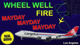 MAYDAY. Wheel well fire. Cargolux Boeing 747-8 requested immediate return. Los Angeles, LAX Real ATC