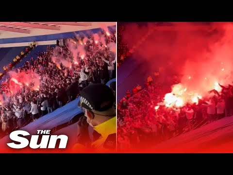 Legia Warsaw ATTACK police, storm Leicester stands & set off flares at Europa League match.