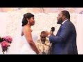 Groom singing to his bride at wedding ceremony