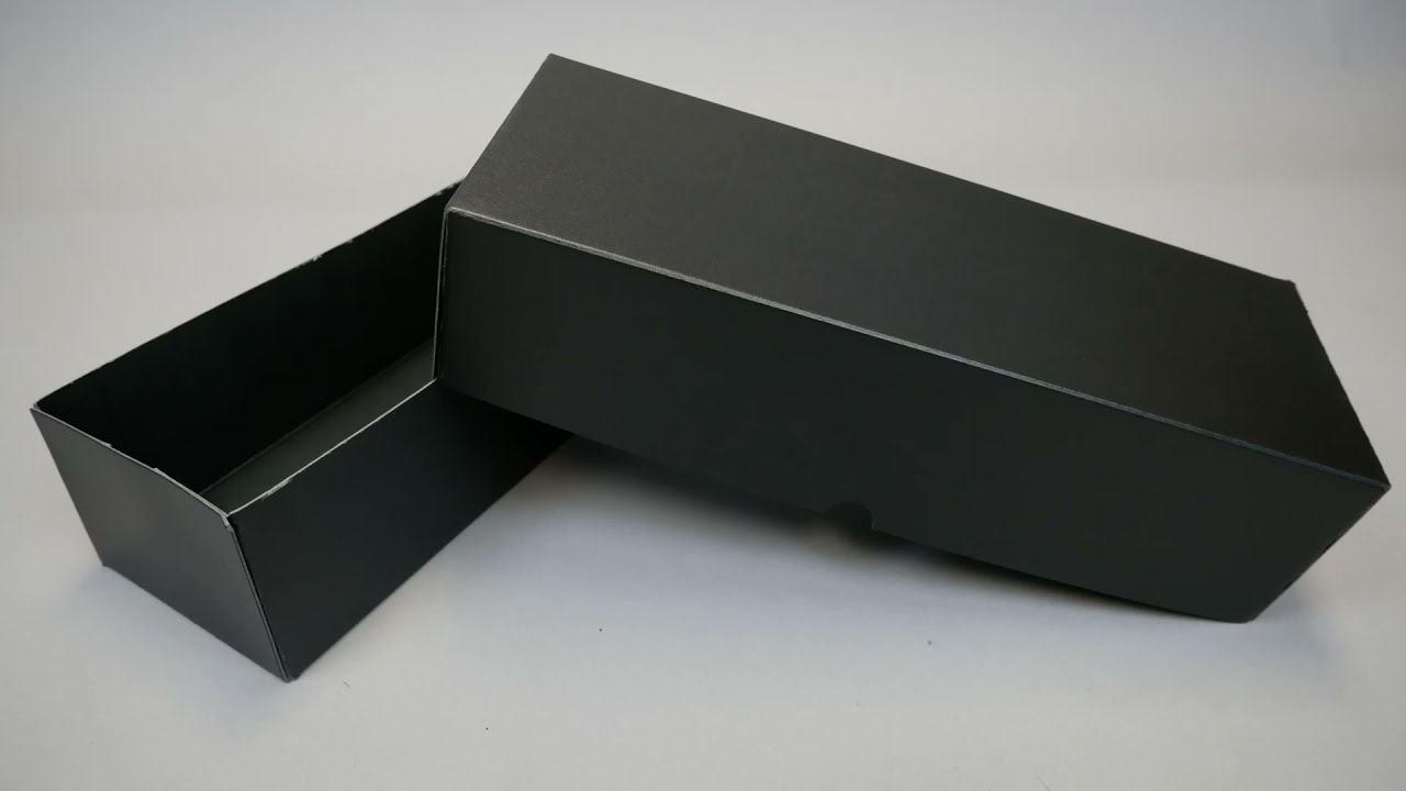 BLACK Storage Box for # 7 Glassine Envelopes., 14-1/4 x 7 x 4-3/4., Made  from .040 thick chipboard. , Wrapped in embossed black paper. 2