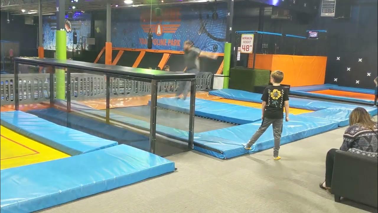 My dad jumps over the 3 ft white and 4 ft tall box trampoline Park Utah