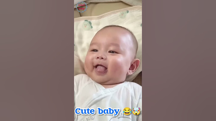"Cuteness Alert: Baby Smiles at Everyone Like a Star!"