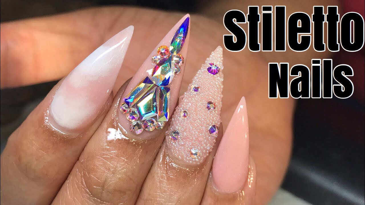 9. Matte Stiletto Acrylic Nails with Marble Effect - wide 6