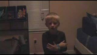 Kid singing Britney Spears scared to death by his mom