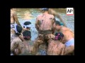 A Crowd Of Men In Chiba Japan Plunged Into A Pool Of Mud As Part Of A Festival To Celebrate The Arr
