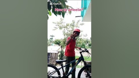 🔥 How to Wheelie Like a Pro! 🚴‍♂️💨 #shorts #stunt #viral #trending #youtubeshorts #mtb #cycling