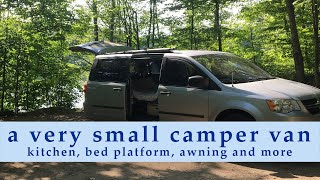 New Van Updates: a very small camper, van so far (bed, awning, solar, kitchen and more)